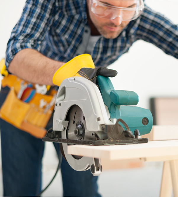 carpenter with saw